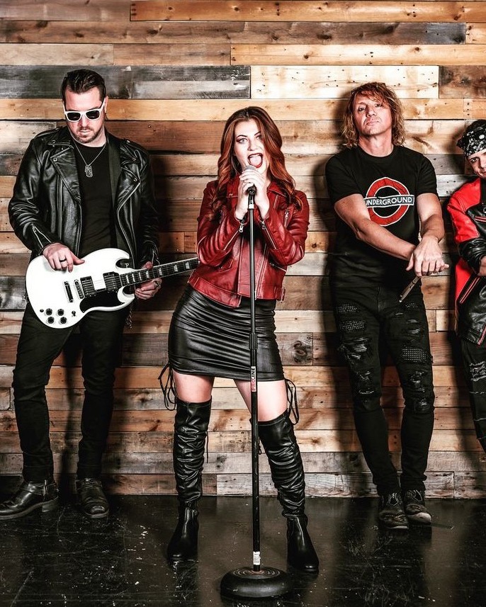 Band photoshoot with the lead singer in a red leather jacket